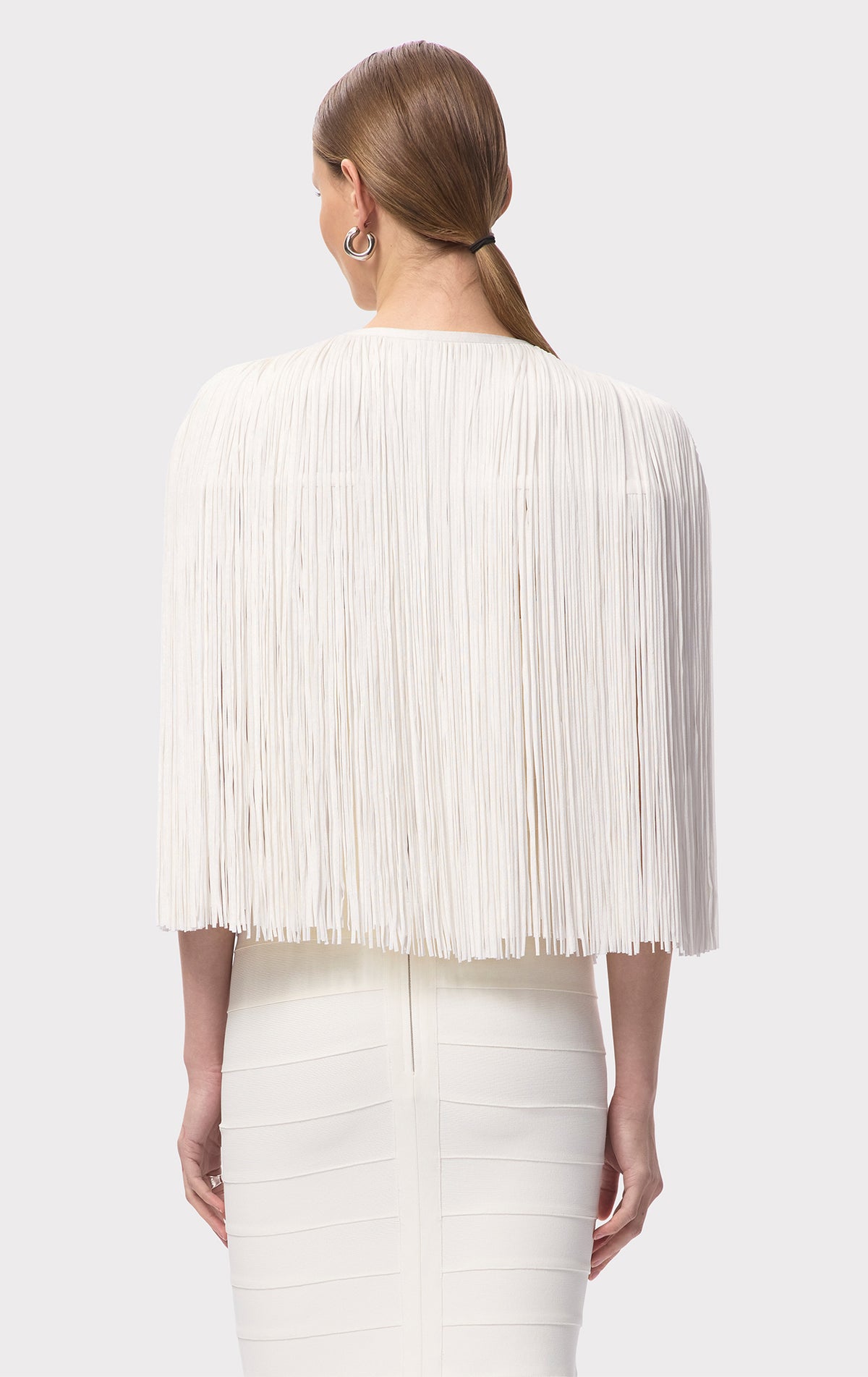 ICON FRINGE CAPE – HERVÉ LÉGER