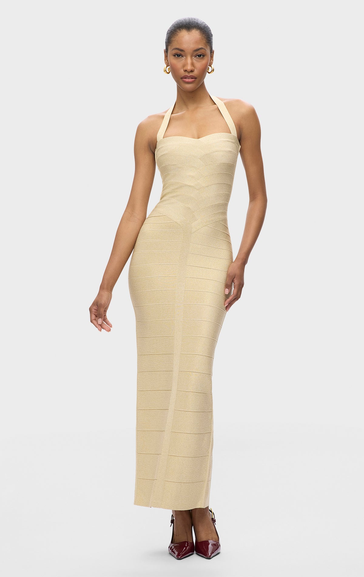 herve leger gold bandage dress ICON METALLIC BUSTIER MINI HERV LGER This Resort 26 debut is a stylish addition to any wardrobe Metallic Bandage Gown by Herv